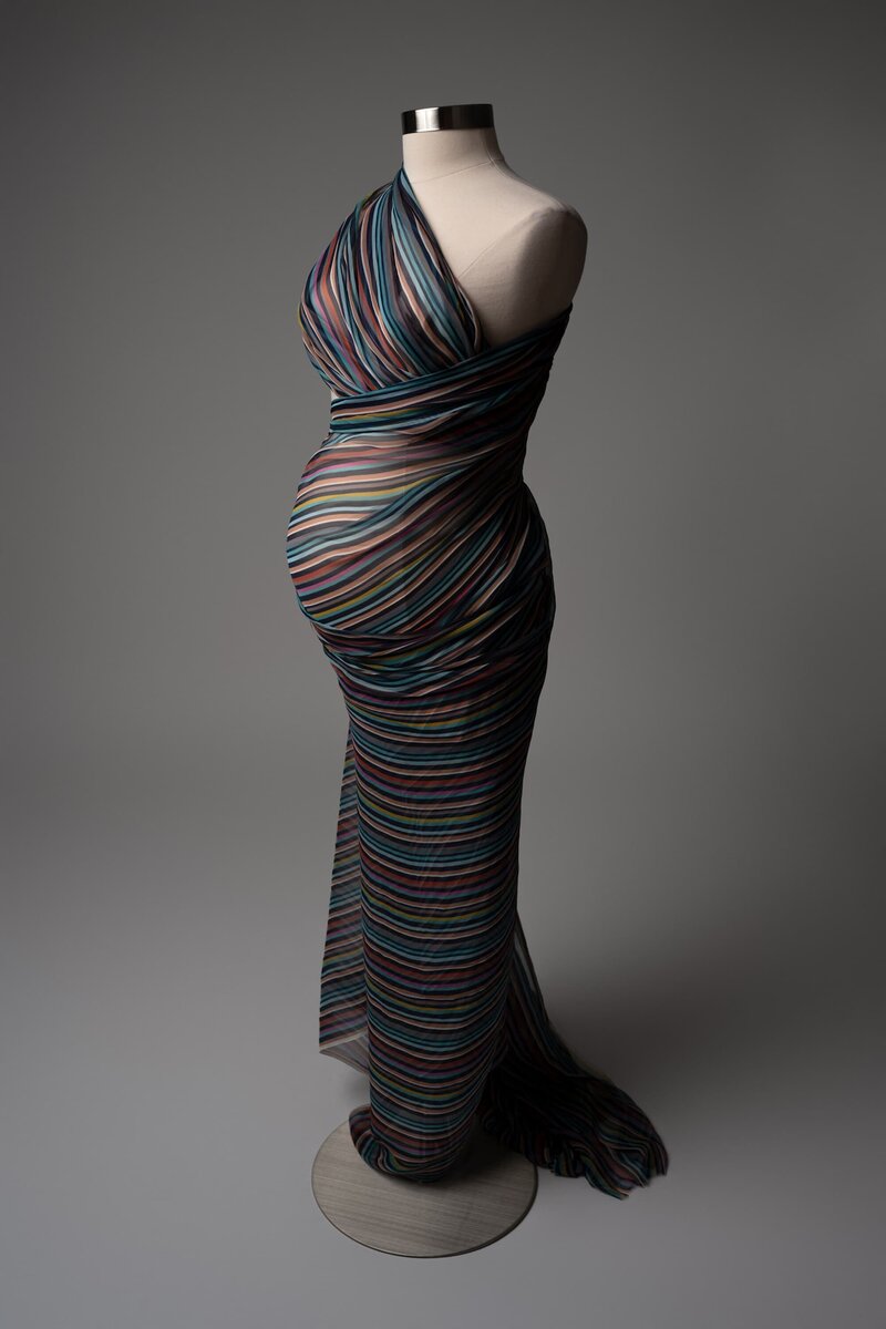 Multicolor striped maternity fabric on mannequin