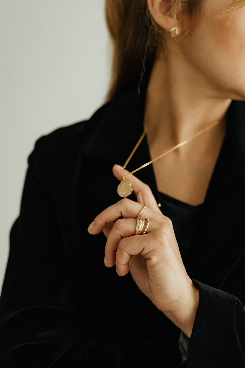 kaboompics_jewelry-photo-shoot-woman-wearing-gold-rings-and-necklace-29247
