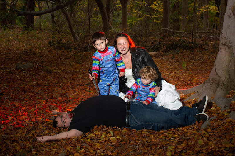 Family dressed as charecters from Child's Play movie for Halloween photoshoot