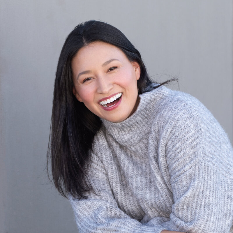 Meet a visionary woman CEO who brings joy and expertise to the world of data analytics. In this captivating image, her genuine laughter, bright smile, and soft gray sweatshirt exude warmth and approachability against a concrete wall backdrop. With her head tilted in confidence, she invites you to join her on a journey of learning and empowerment. As a leader in data analytics, she offers invaluable insights and strategies to propel your understanding of this dynamic field. Whether you're a novice or seasoned professional, her passion and expertise promise to demystify data analytics and unlock new opportunities for growth and success. Embrace the wisdom and guidance of this visionary CEO as you embark on your data-driven journey to success.