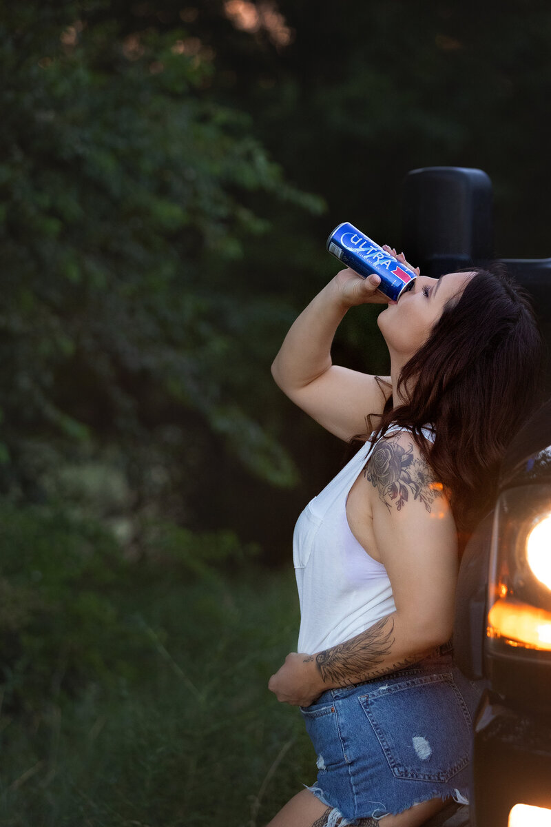 Beer poster boudoir session - outdoors with a big truck