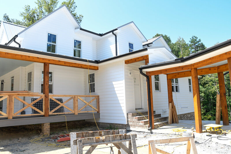 custom built farmhouse white siding interior