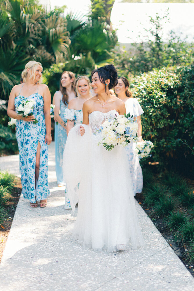 bride and bridesmaids walking