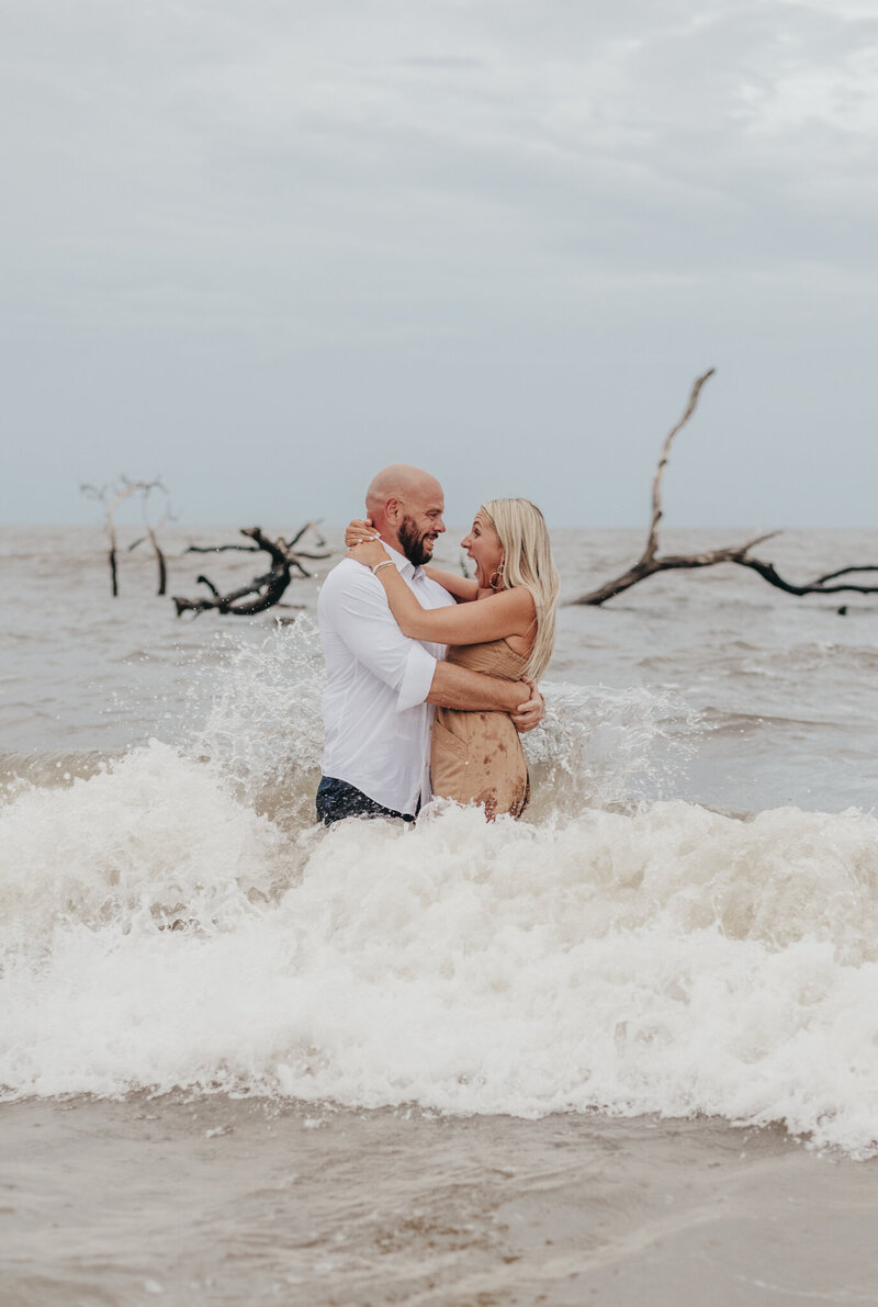 couple in water on hunting island