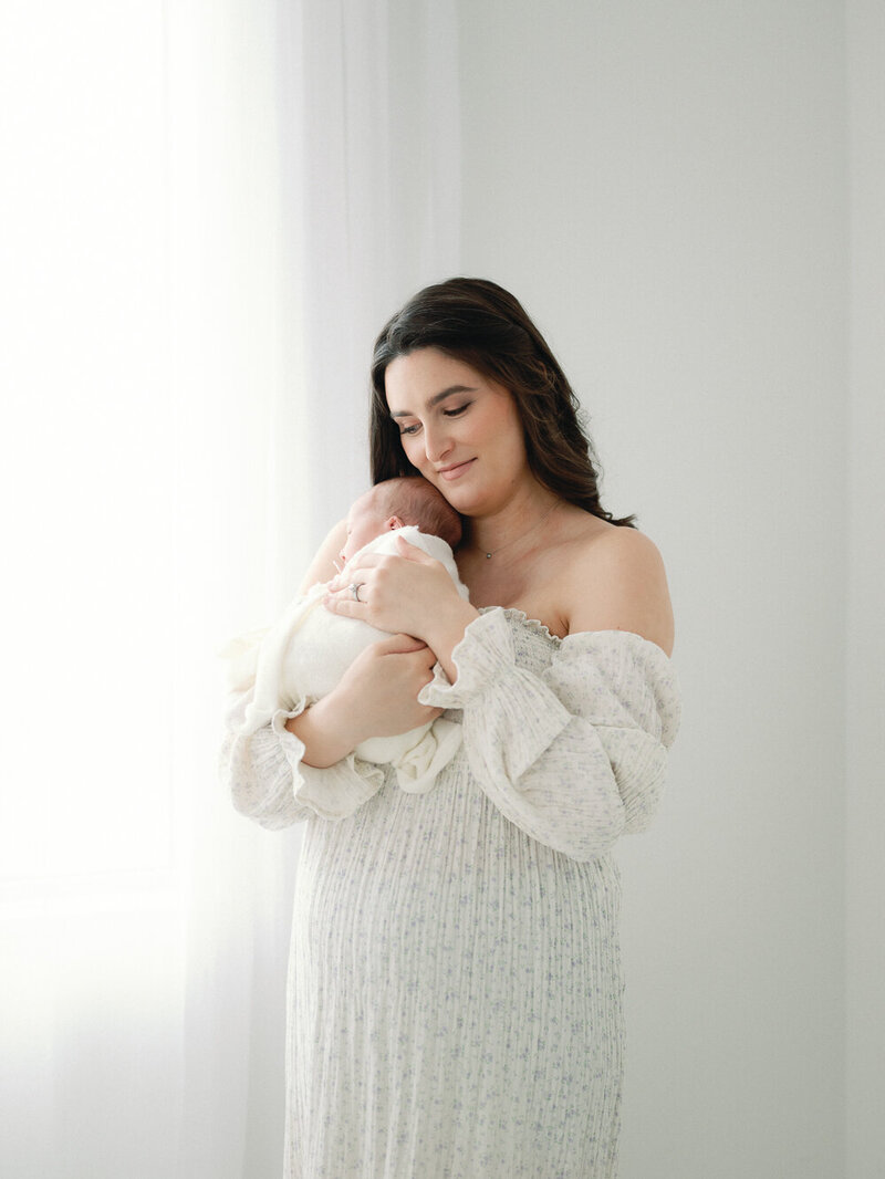 Brooke Lacombe is an Ottawa, Ontario based baby photographer, specializing in motherhood, maternity, newborn and family fine art photography.