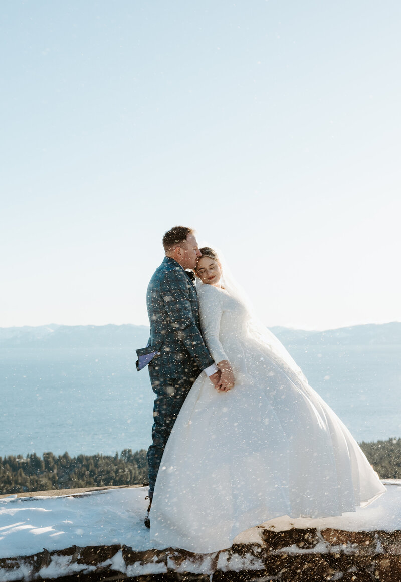 Couple hiking to their adventure elopement ceremony in Lake Tahoe