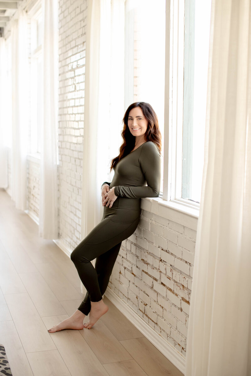 Woman making direct eye contact, inviting you to connect