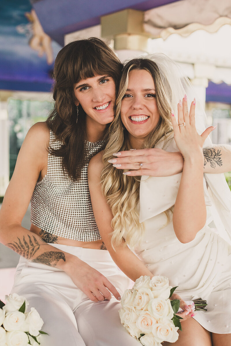 LGBTQ+ couples poses for elopement photos in las vegas