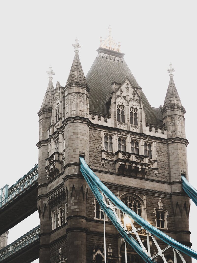 London's ower Bridge and blue suspension beams shrouded in fog