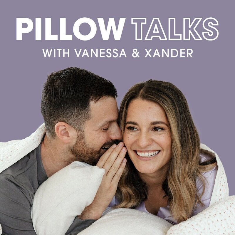 Vanessa, a sex therapist, smiles while Xander, her husband, whispers in her ear. They are in a bed propped up on their elbows. The overlay text reads "Pillow Talks with Vanessa & Xander." The entire image is the logo for their weekly podcast on sex and relationships, Pillow Talks.