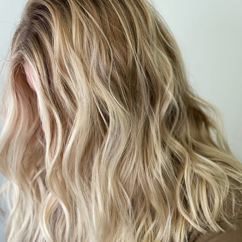 best colorist for blondes in Madison, MS featuring a blonde balayage. 