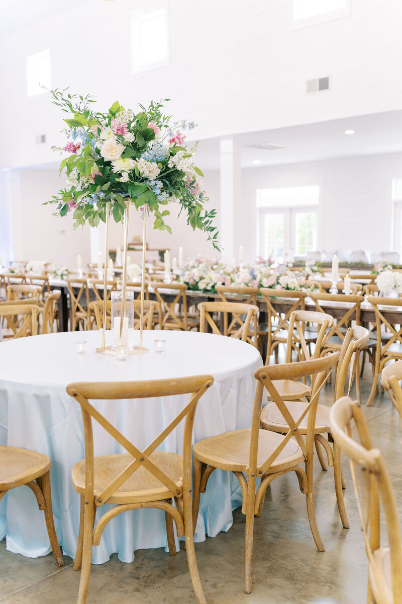 white and wood decor elements for a wedding reception