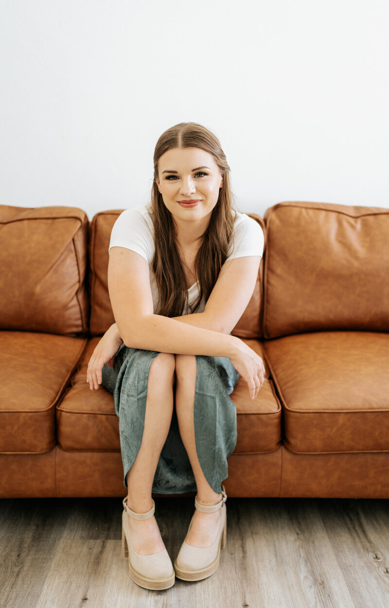 woman sitting on couch