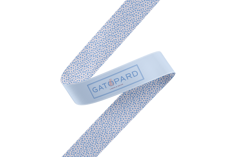 Blue and blush leopard print ribbon with rectangular Gatopard logo