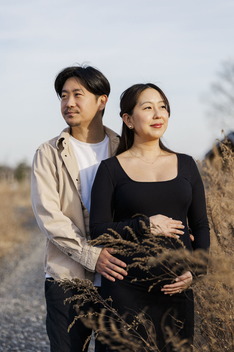 Candid Hudson Valley maternity photos in Newburgh with genuine smiles and warm light