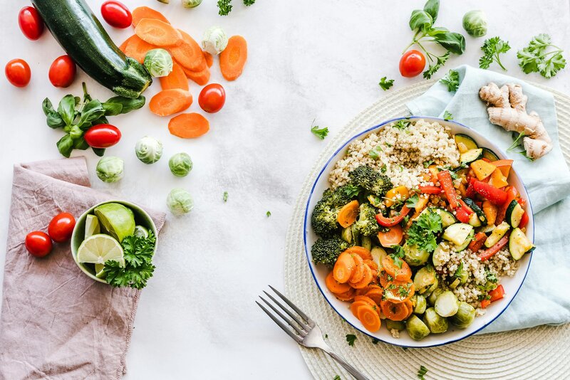 A probiotic-rich meal featuring yogurt, fermented vegetables, and fresh greens.