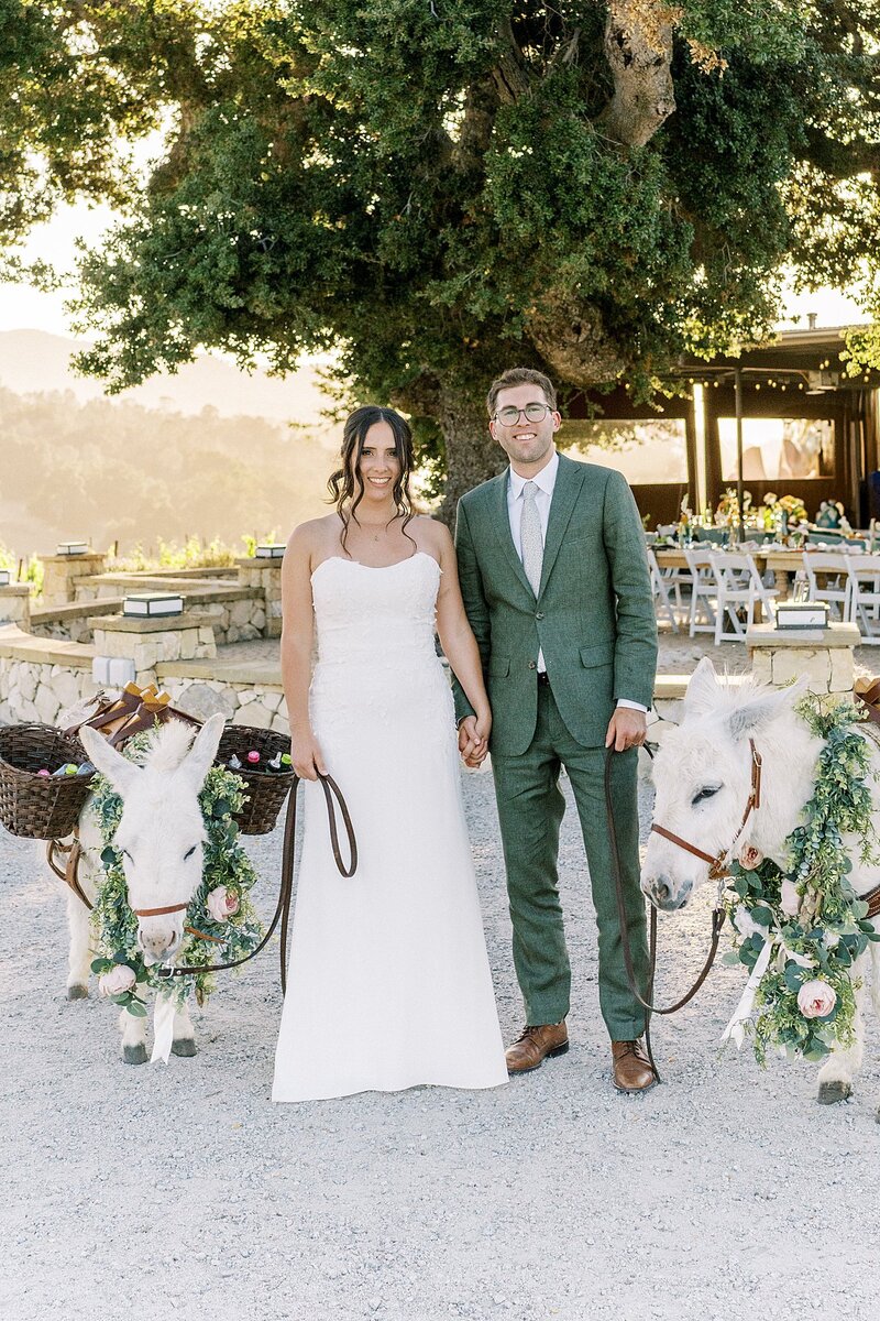 Bride and groom smiling at their wedding reception in paso robles.