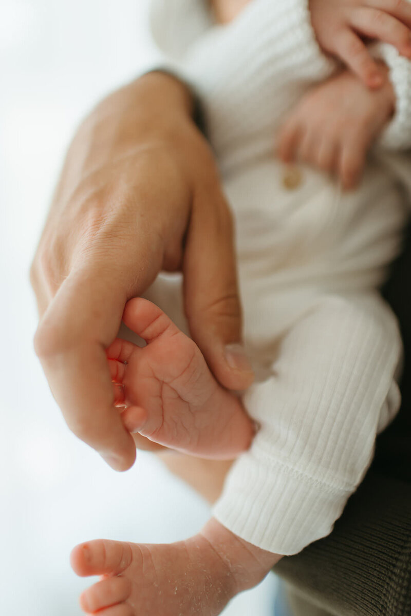 Wichita newborn photographer Ashley Cole photographs your newborn and family with joy and care