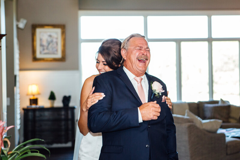 Bride and Father Laughing