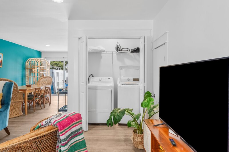 Convenient in-unit laundry with washer and dryer at Tropical House, a 2BR PCB rental near beach access and Pier Park.