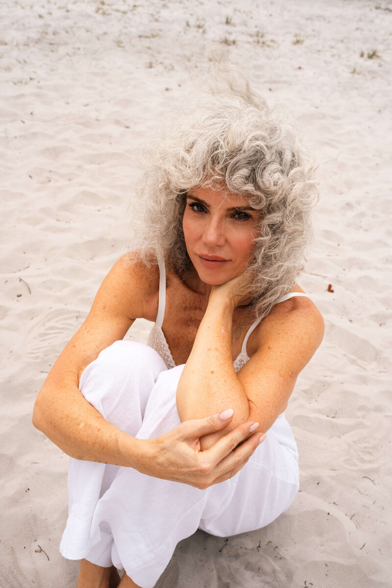 portrait of older woman model at the beach