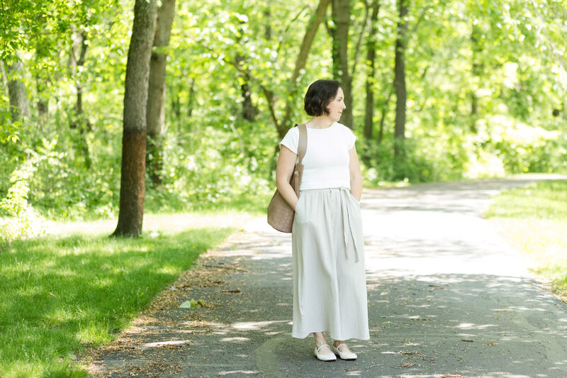 Dinah walking on a trail in the woods