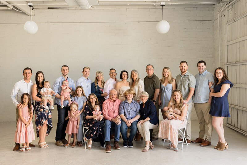 extended family photo of a group of  25 people