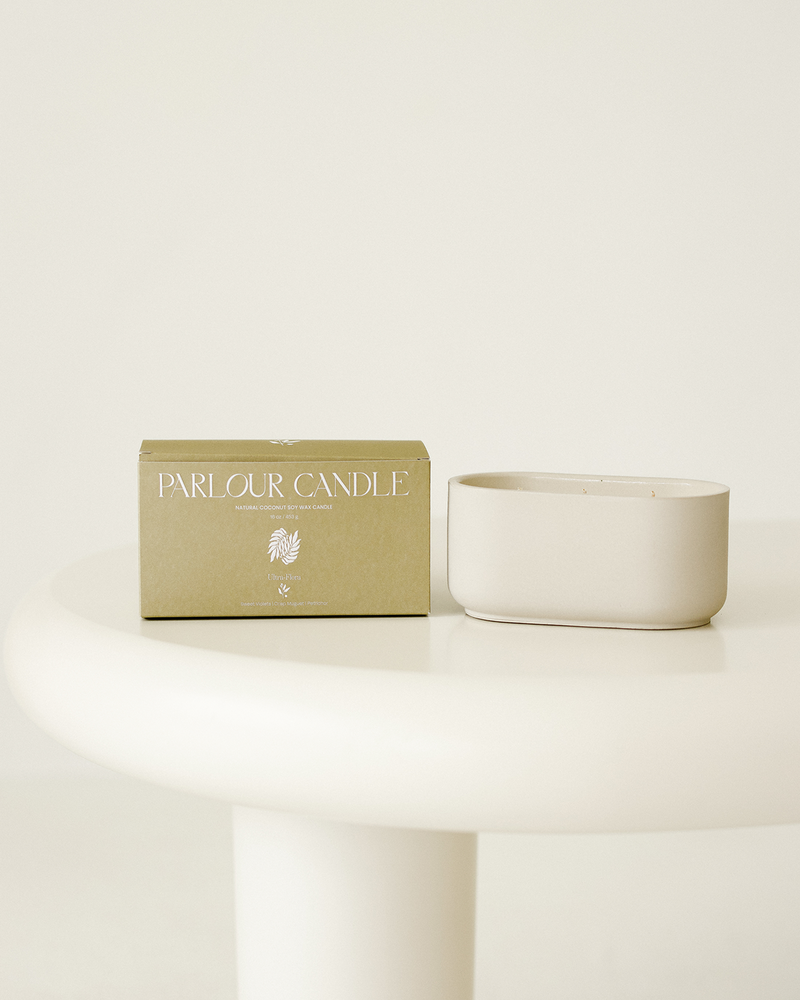 Parlour Candle is a handcrafted candle and home decor line created in a 100-year-old studio space. Using 100% natural coconut soy wax and high-quality, paraben- and phthalate-free fragrance oils, each candle vessel and decor piece is handmade with natural earth pigments and concrete. The line emphasizes sustainability, featuring fully recyclable vessels and no excess plastic in the packaging.
