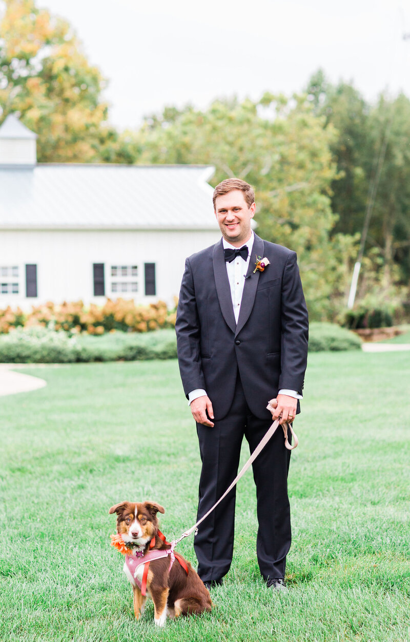 groom with dog