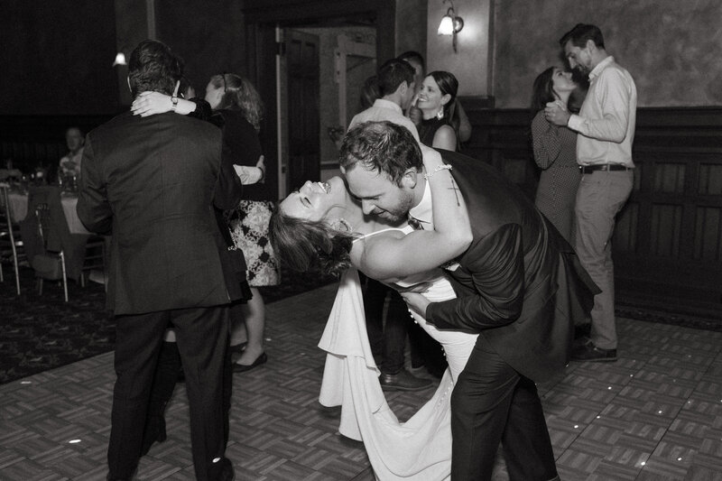 Couple dances joyfully at their wedding reception in the Beaumont Hotel in Ouray Colorado