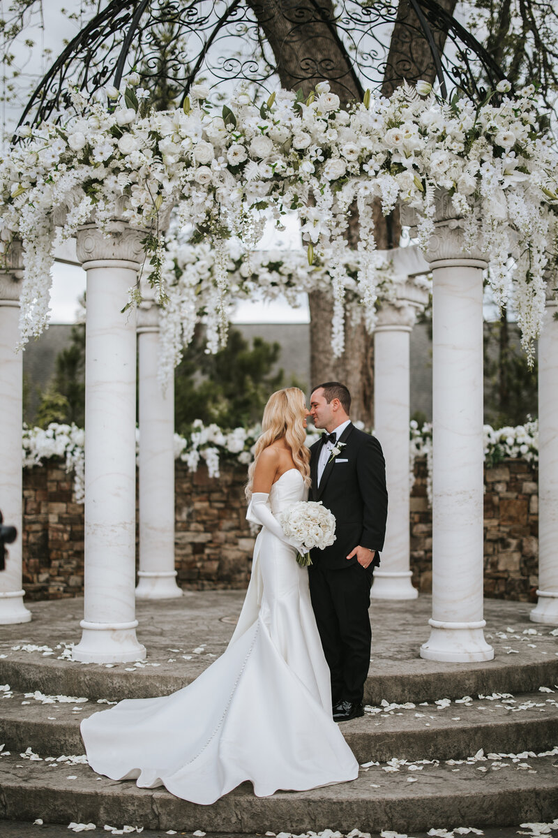 Bride and groom sharing a moment before their ceremony.