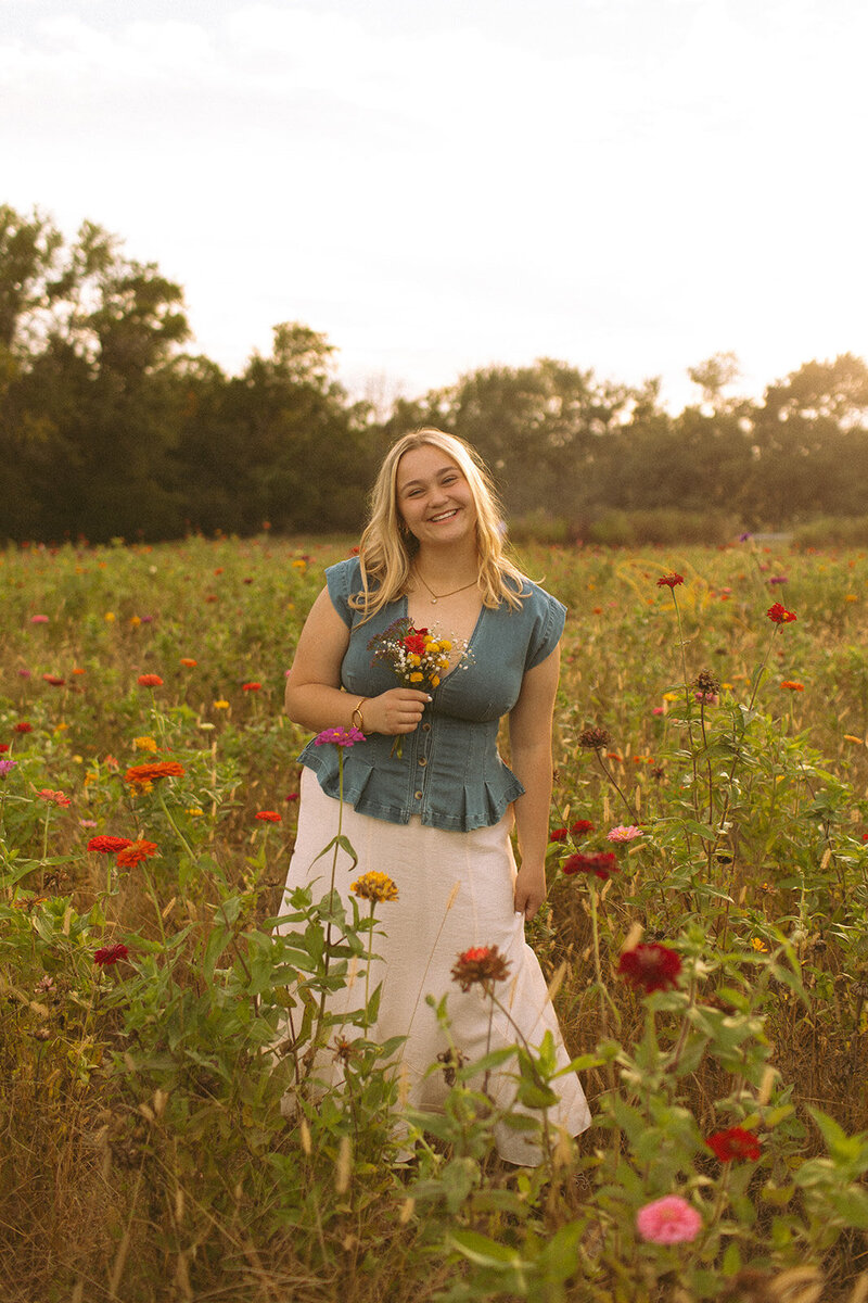 Senior Photos in a flower field in Wichita Kansas with Ashley Cole Photography
