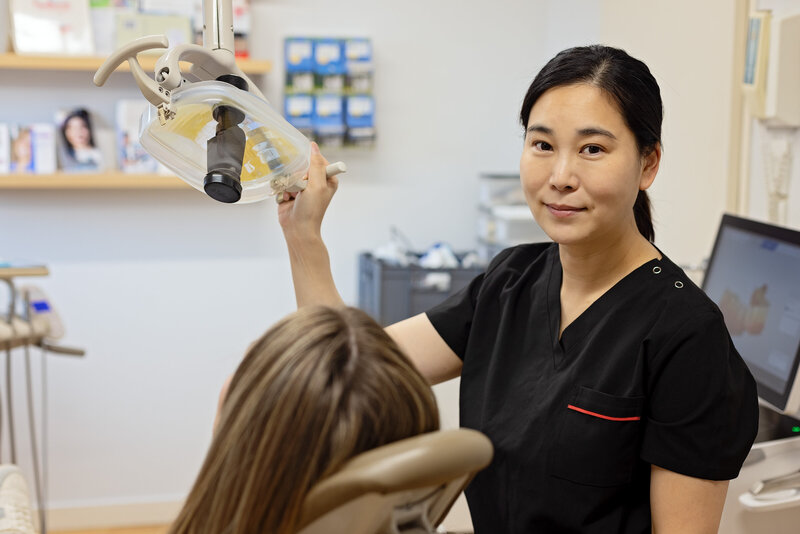 smiling dentist - Alicia Seo
