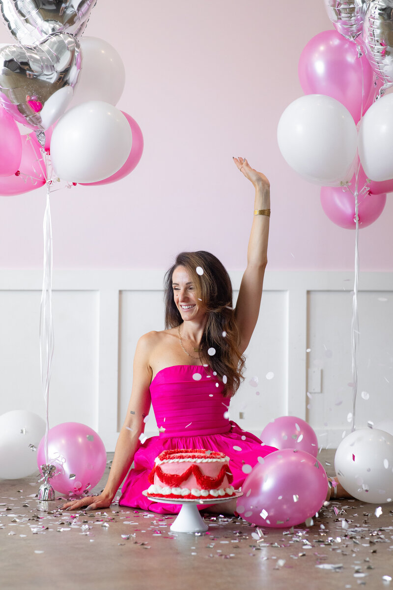 Birthday girl smiling with confetti in Hollywood studio