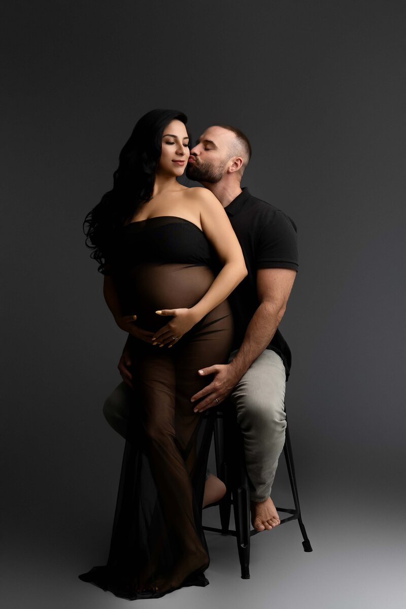 maternity photographer in woodland, ca. maternity session. couples portraits. expecting parents. editorial. all black wardrobe. motherhood. in studio session. portraits. maternity journey