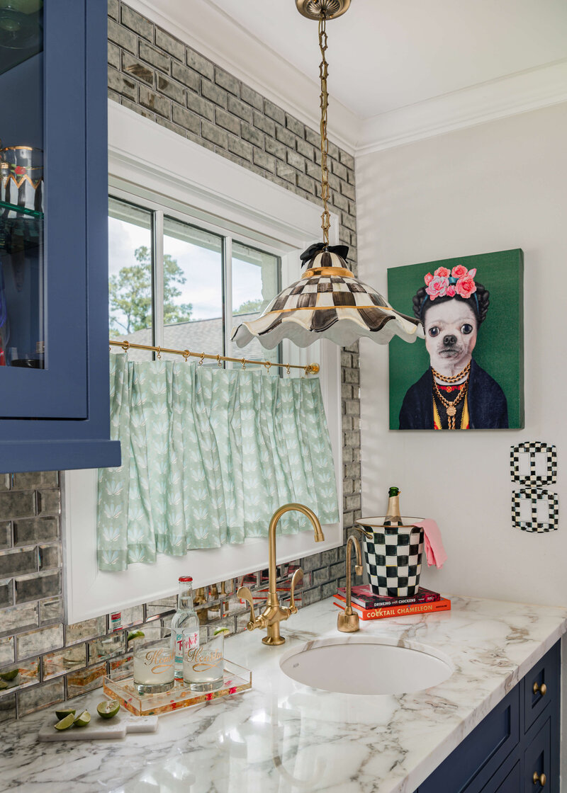 A bathroom with a dog picture