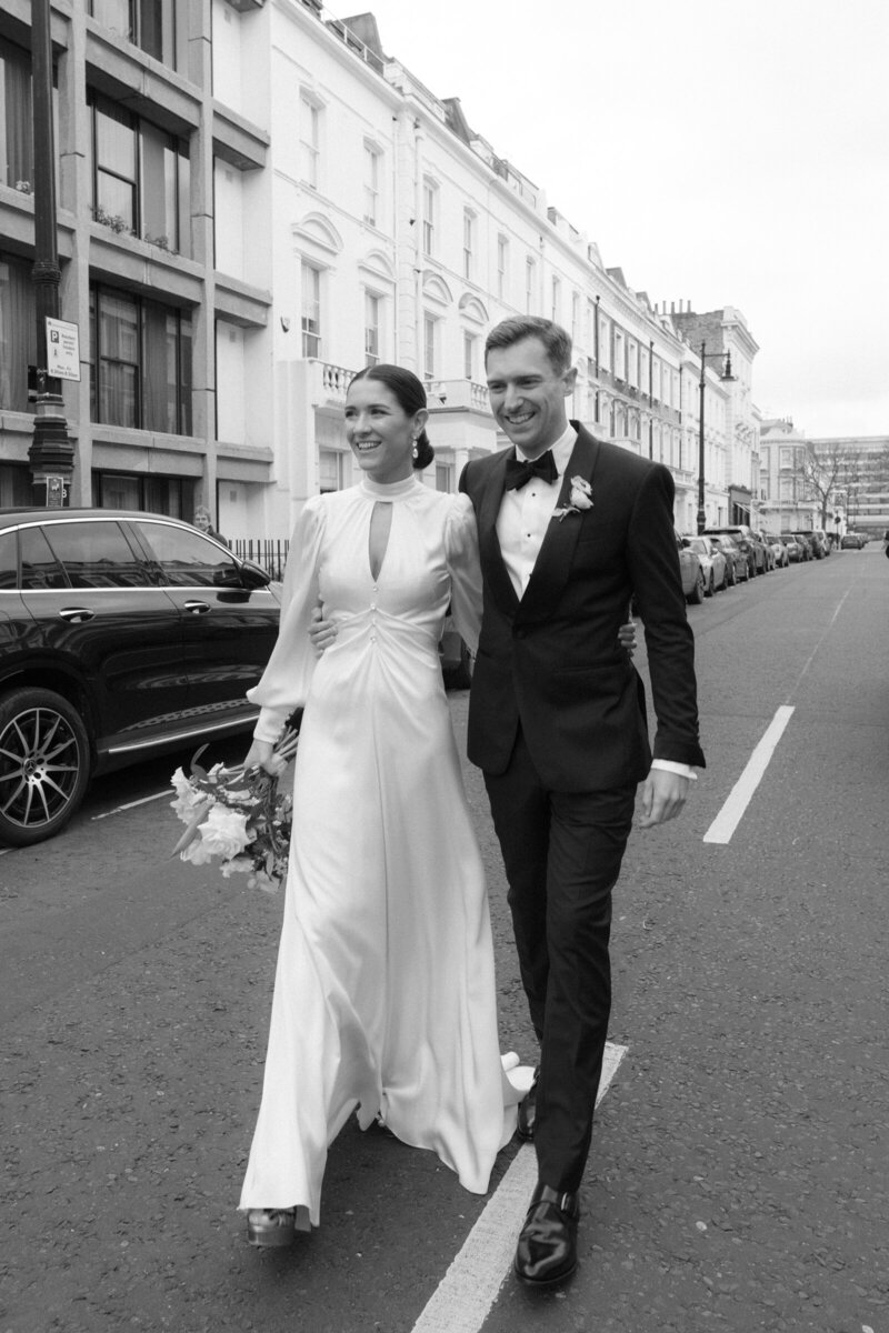 Fashion-forward London wedding photographer documenting modern couple in city streets