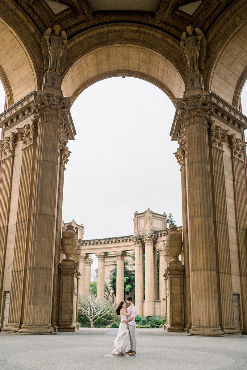 A romantic engagement session at the iconic Palace of Fine Arts in San Francisco, California, captured by Tiffany Longeway Photography.