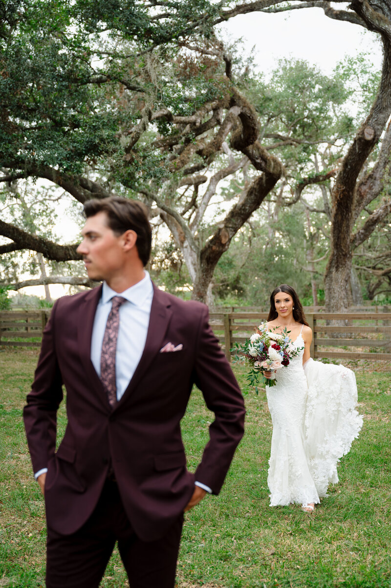 Bride and Groom veil photo with ring Bella Cosa Venue Lake Whales Florida
