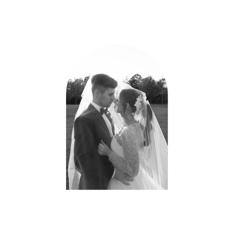 Couple sitting on a dock holding hands