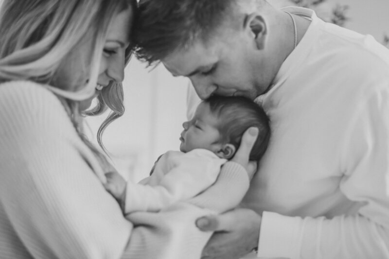 Family of three in a field