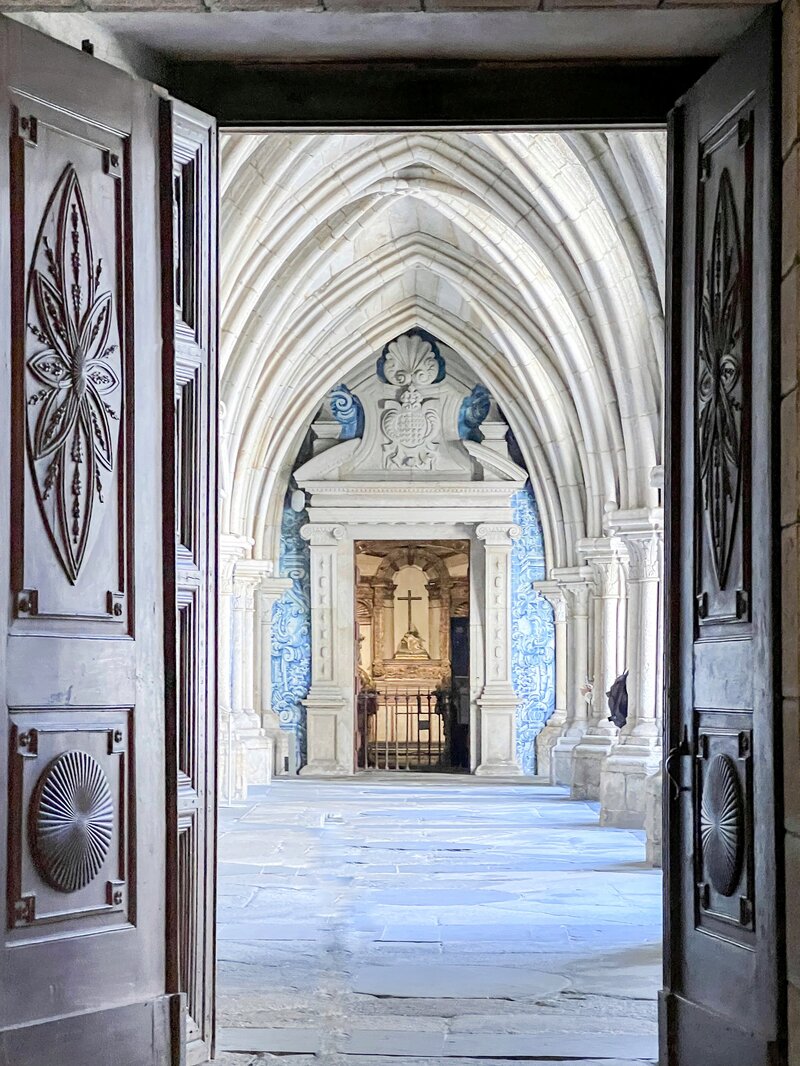 Tiles in Porto cathedral with open doors 