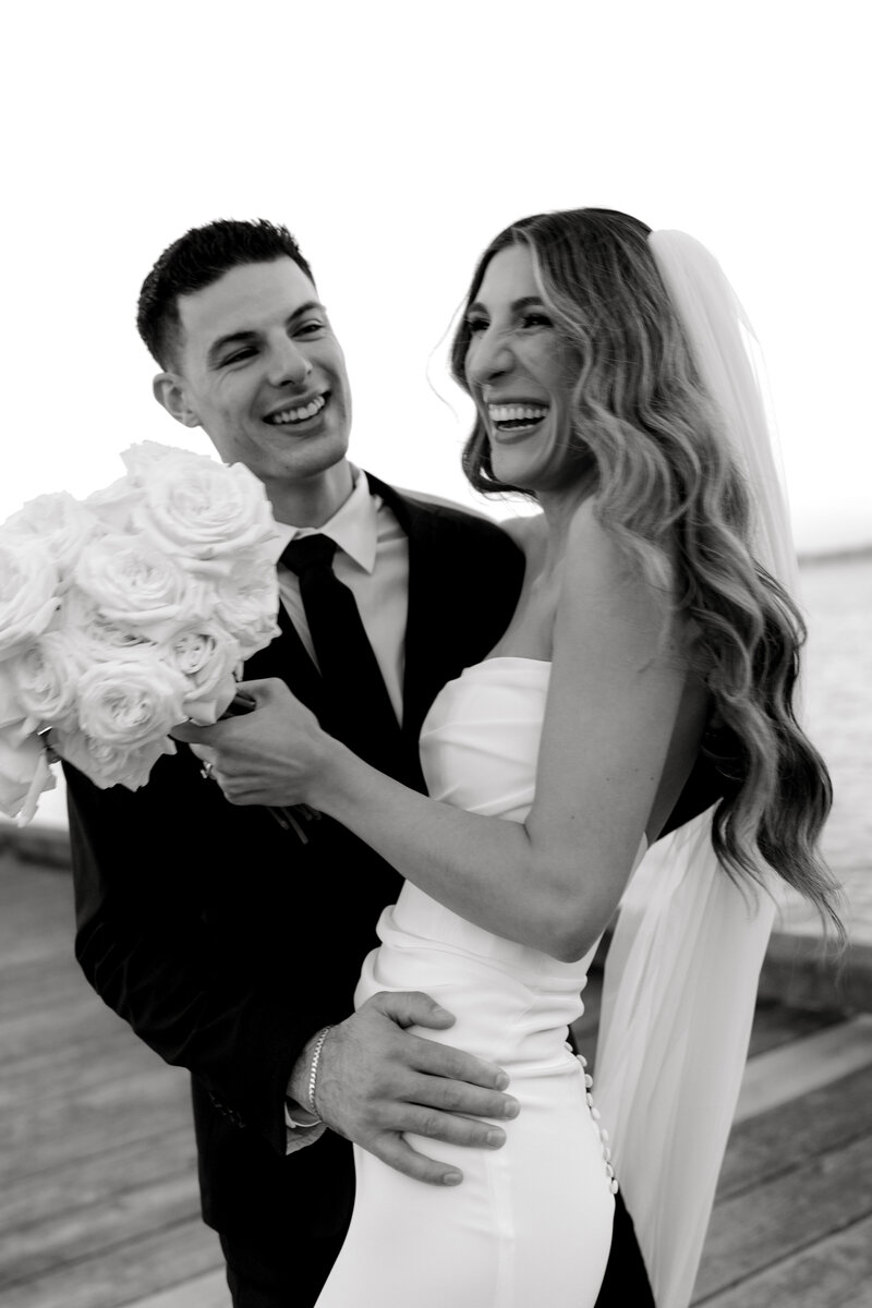 Wedding Photographer Newport RI | Rhode Island Caprio Captured Photography | Bride and Groom Laughing In Black and White