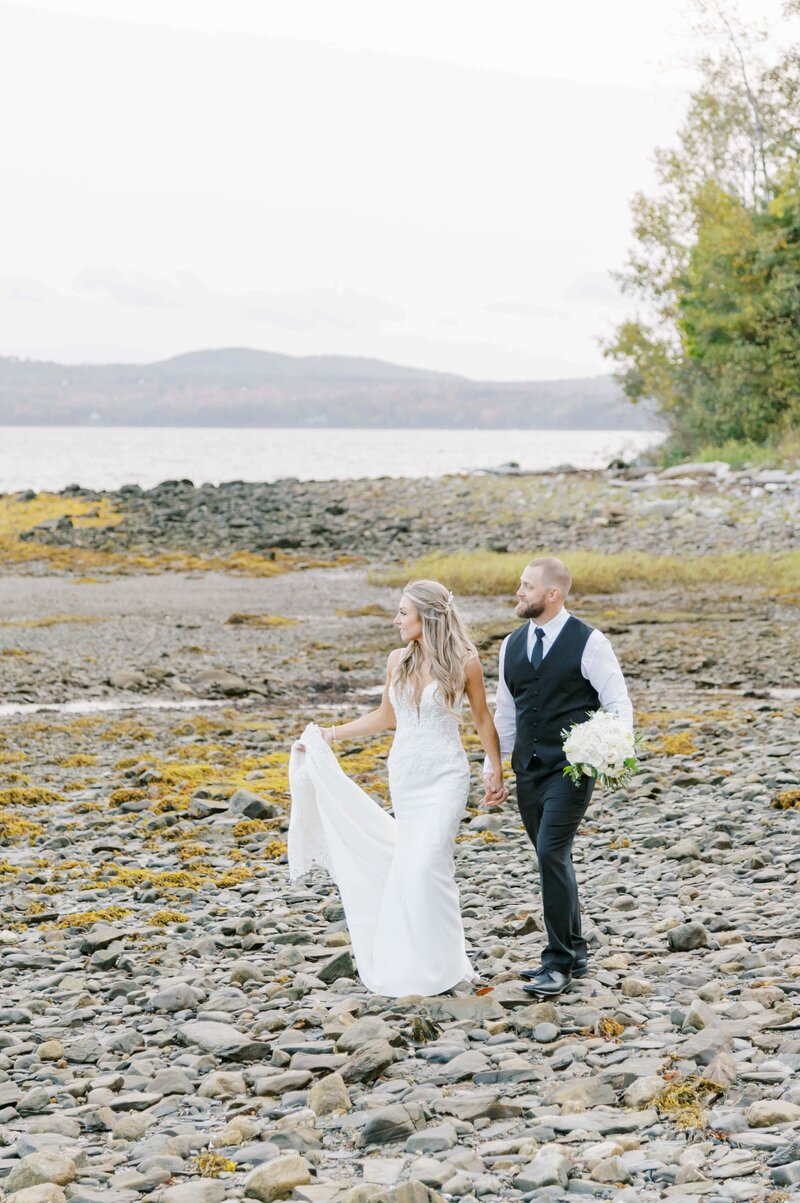 Captured in Southern Maine, this beautiful wedding moment showcases a couple sharing a quiet, intimate moment under the bride's veil. Felisha, a New England wedding photographer, specializes in timeless, authentic photos that reflect the heartfelt connections of her couples, whether in the serene beauty of Maine or beyond.