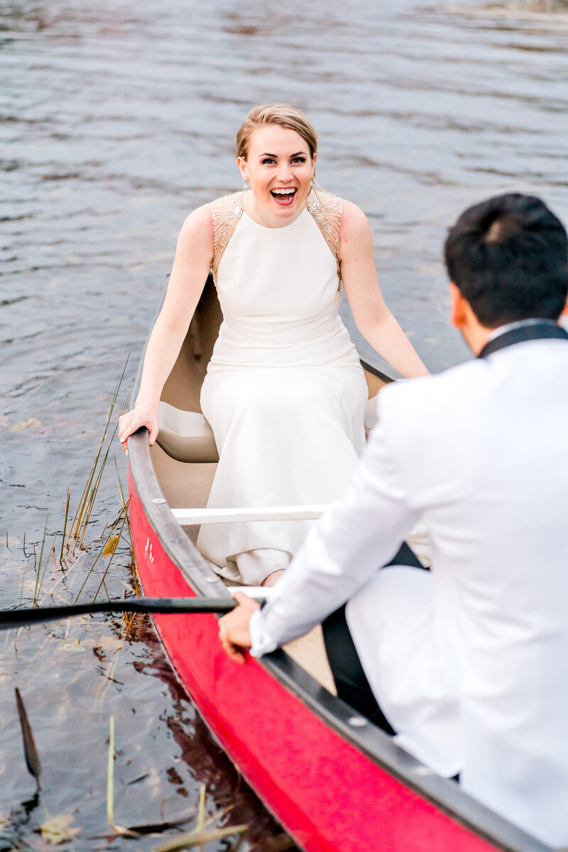 Couple in a canoe in the water | Maine elopement photographer | Adventure and Vows