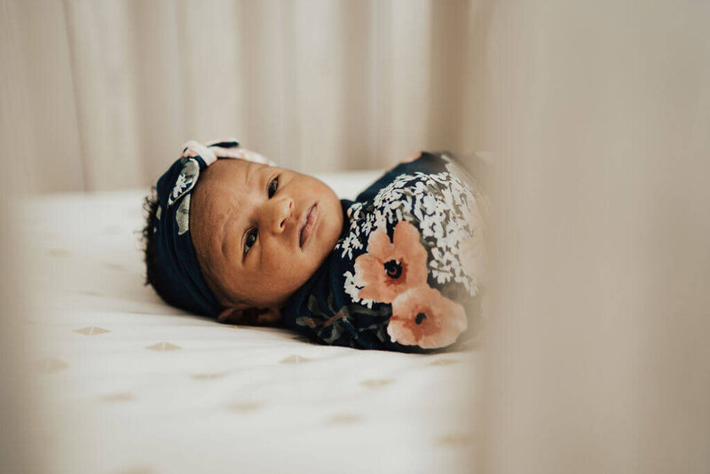 newborn in nursery photos