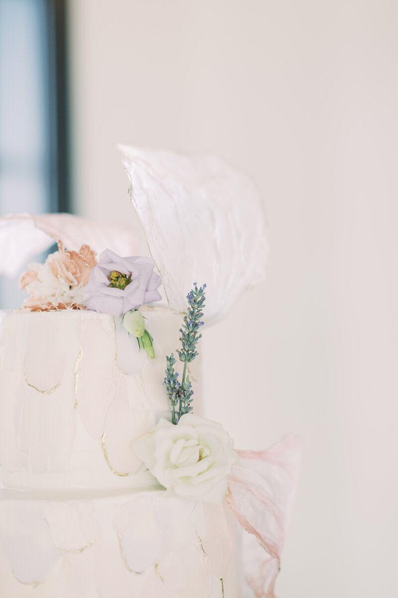 Light pink and purple wedding cake created by Ruby Jean Patisserie and photographed on film.
