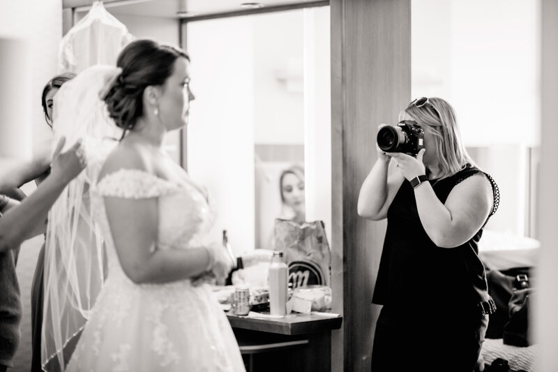 Nicole Hoffman shooting a bride getting ready on a wedding day