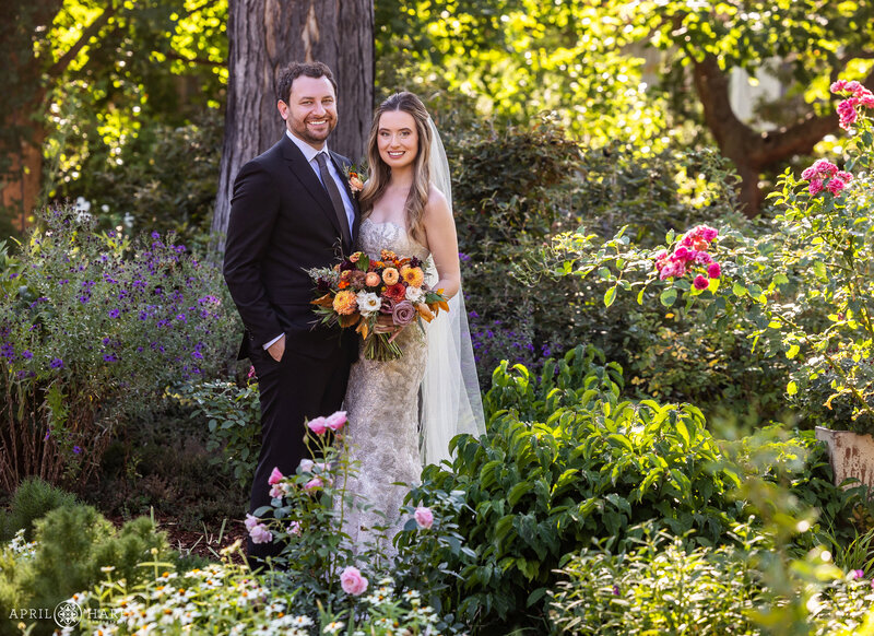 Couple photographed on their wedding day in the Oval Garden at Denver Botanic Gardens