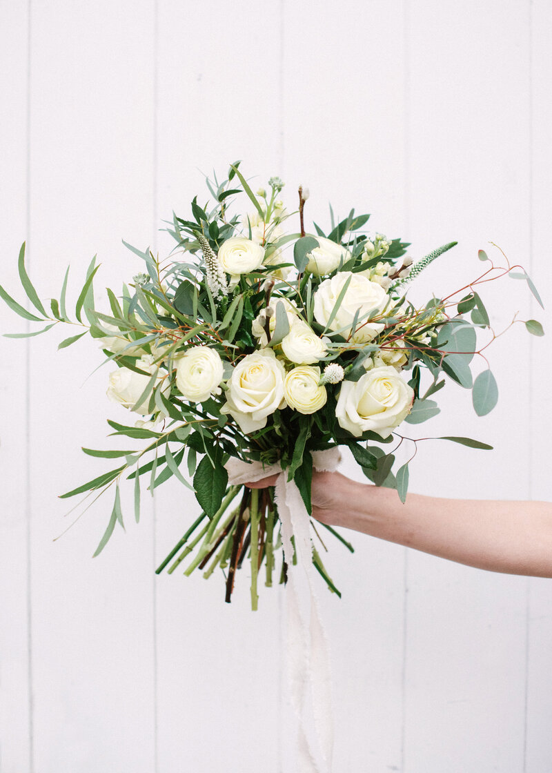 bridal bouquet roses eucalyptus